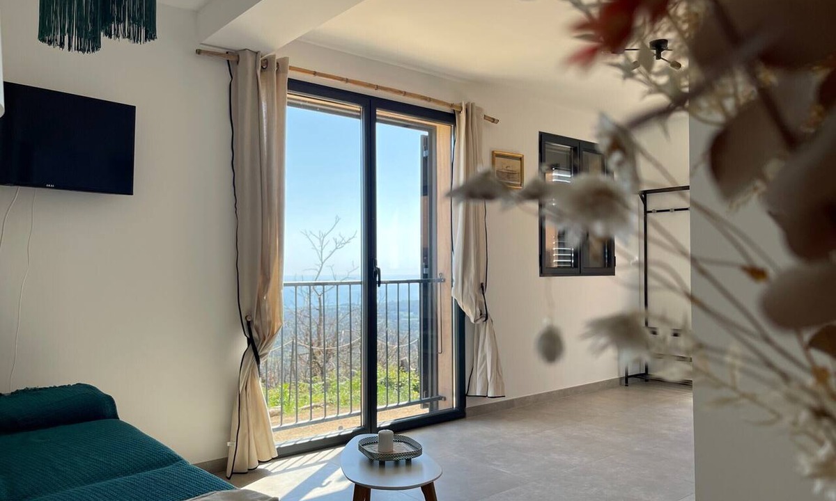 Cervione Apartment | Apartment 'Nucciola' with Sea View, Private Garden, and Air Conditioning