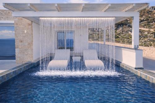 Karpathos Town Villa | Aqua blue villa with private swimming pool