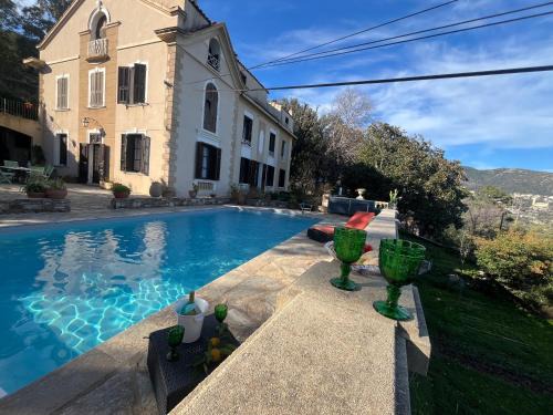 Cardo Apartment | Bastia, appartement ds villa de caractère avec piscine, jacuzzi et vue mer