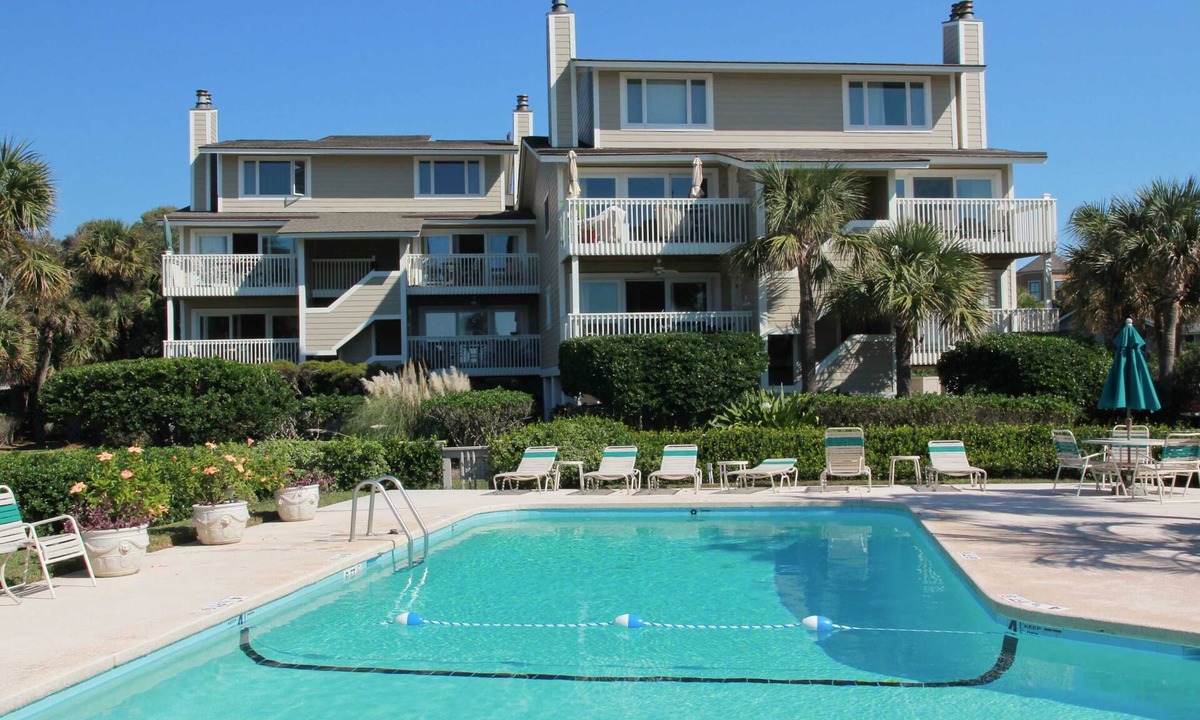 Isle of Palms House | Beautiful villa surrounded by lush landscaping - walk to beach, golf & pool