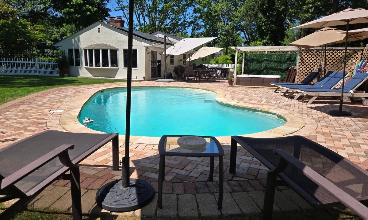 Hampton Bays House | Charming Split-Level House with heated pool, hot tub & a brand-new septic system