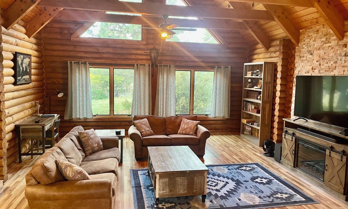 Flagstaff House | Cheerful Cabin with large stone patio and hot tub, next to trails!