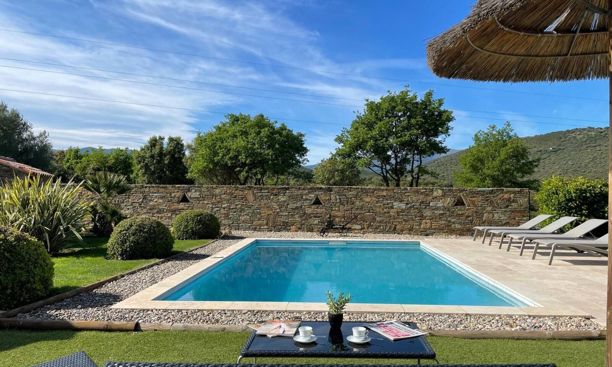 Oletta House | Contemporary villa with swimming pool and private garden