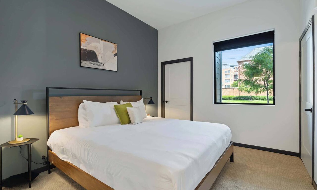 Lockerbie Square Apartment | CozySuites Mass with lounge and roof deck #1