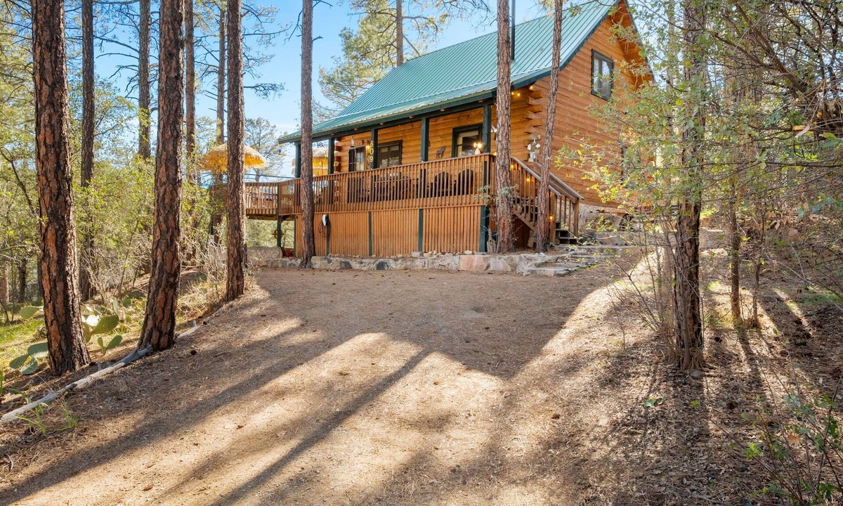 Mountain Club Cabin | Easy Walk to Downtown Whiskey Row. A Log Cabin in the Pines.