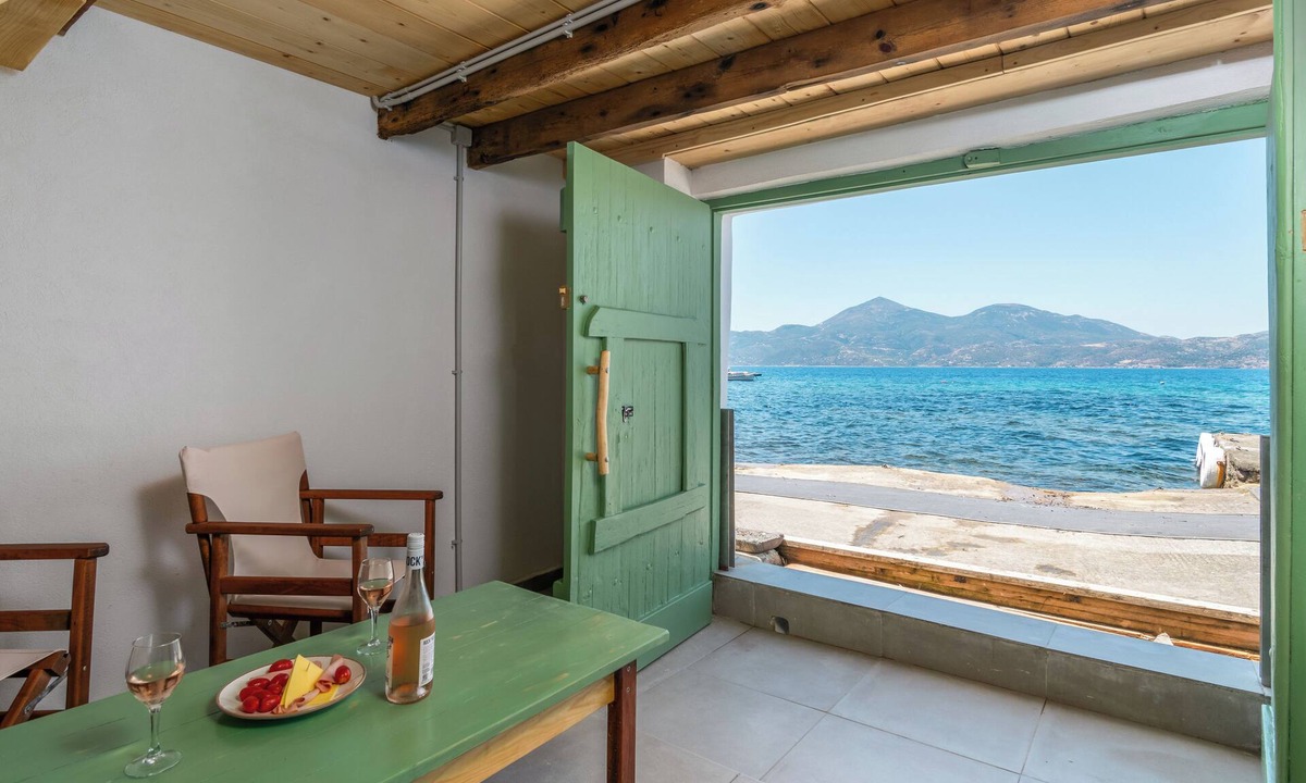 Tripiti Boat Rental | Klima Milos sea front boat house
