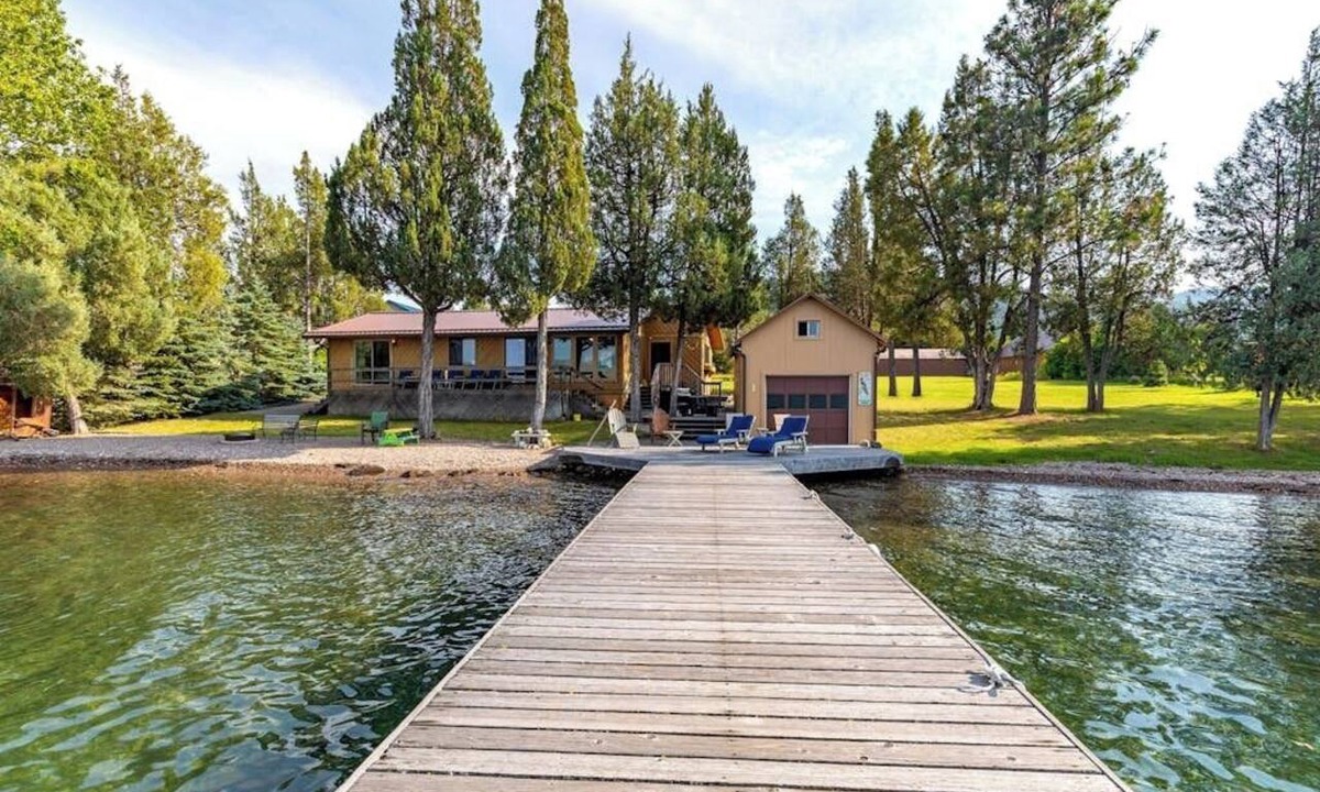 Big Arm House | Lakefront home with private beach, dock, firepit, & grill - dazzling sunset view