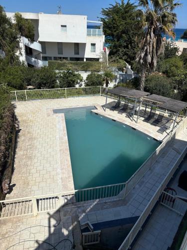 L'Ile-Rousse Apartment | Le Rocher - Appt pour 6 climatisé avec piscine