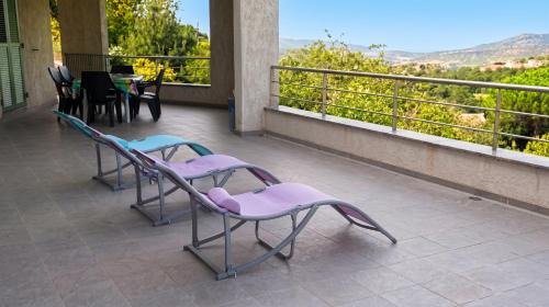 Oletta House | Maison confortable avec vue sur la mer et la montagne à Oletta.