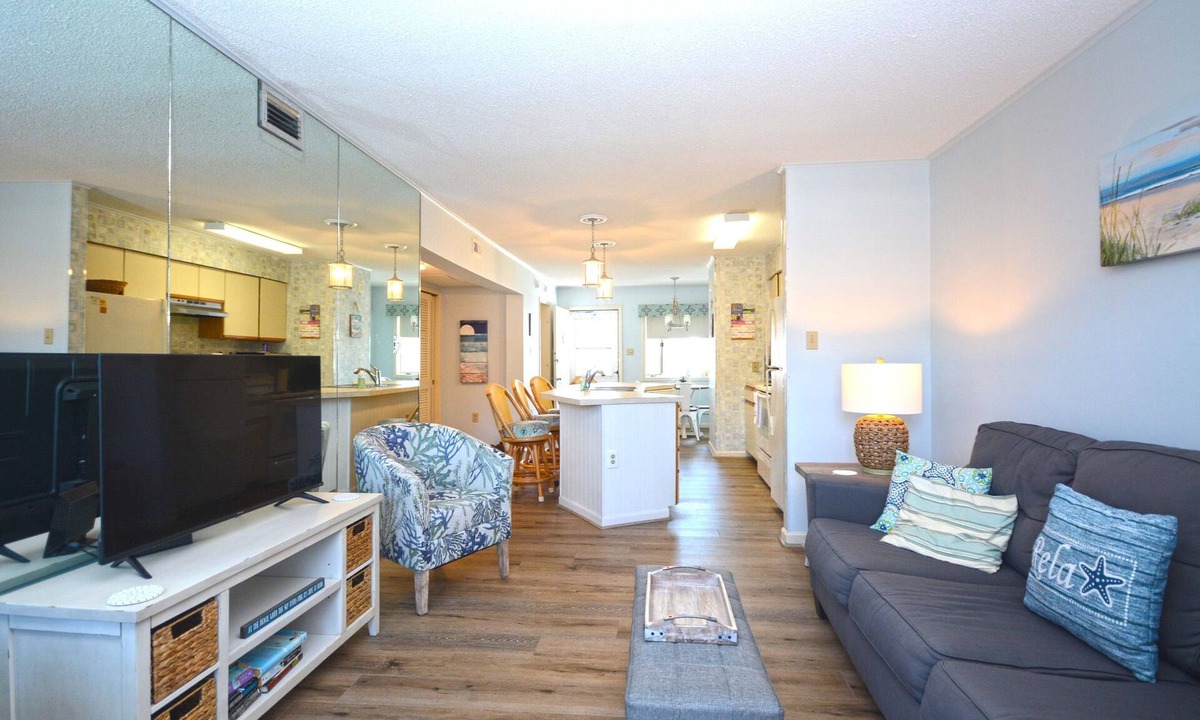 Midtown Ocean City Condo | Nice 2 bedroom condo with pristine hardwood floors, free WiFi, and an outdoor pool located midtown and only a block to the beach!