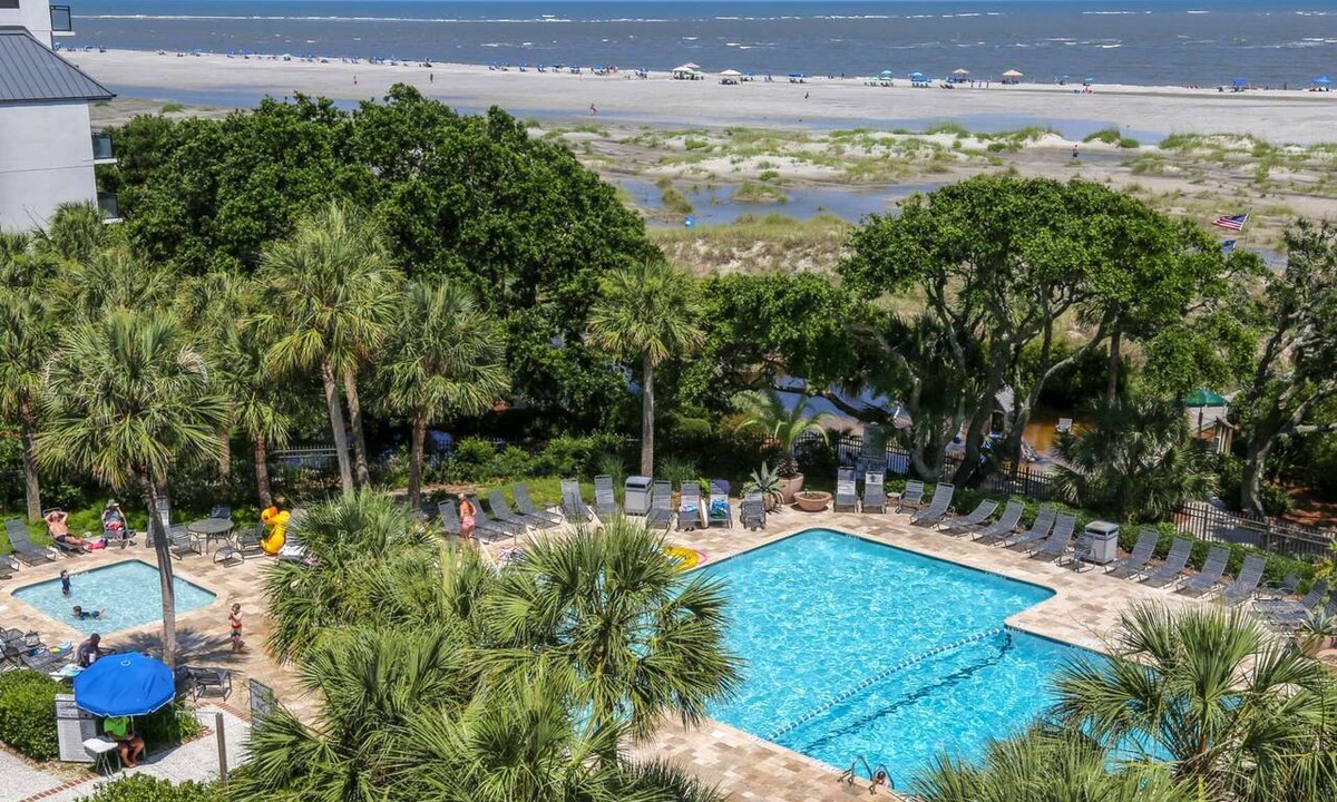 Isle of Palms Condo | Renovated Penthouse with Ocean Views, Community Pool, Kid Pool, Beach Access & Roof Deck