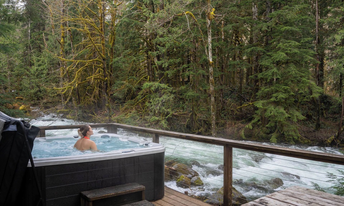 Baring Cabin | River Runs Through this secluded A-Frame, hot tub