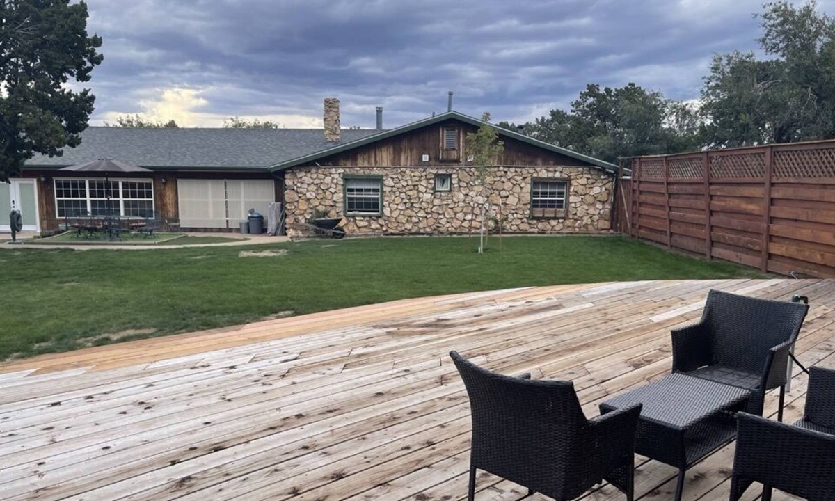 Winona House | Rustic home built stone house in the country surrounded by forests .