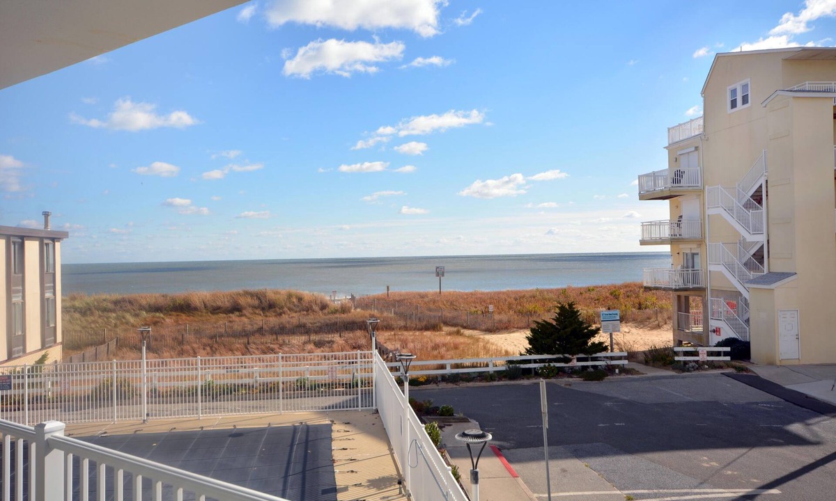 Midtown Ocean City Condo | Traditional, stylish 2 bedroom oceanfront condo with free WiFi, and outdoor pool, and a stunning ocean view located in quiet midtown near mini golf and bowling and just steps from the beach!