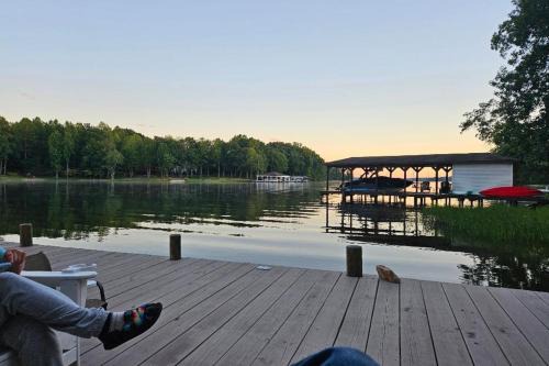 Bumpass House | Tranquil lakefront retreat with hot tub, screened porch, kayaks, and more