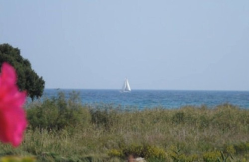 Pietracorbara Apartment | 1st floor Villa El bimbo 50 metres from the sandy beach