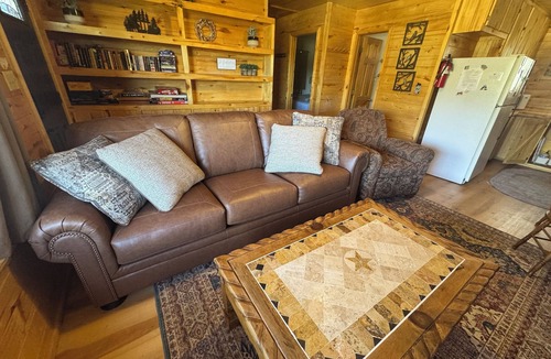 Greer Cabin | 2 BR-1BA Cabin on Main Street. Stocked trout pond, porch, grill, good dogs free🐾