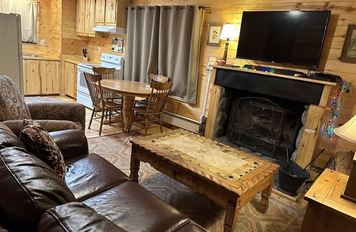 Greer Cabin | 2 BR-1BA Cabin on Main Street. Stocked trout pond, porch, grill, good dogs free🐾