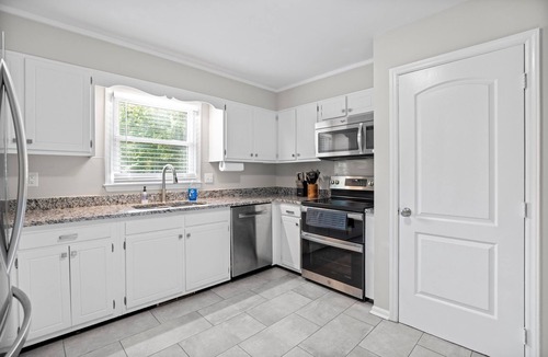 Greensboro House | 2 Kitchens 3 Living Spaces Perfect for Groups Fire Pit