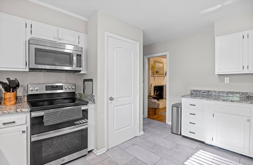 Greensboro House | 2 Kitchens 3 Living Spaces Perfect for Groups Fire Pit