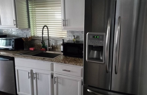 Biggs Field House | 3-bedroom home with AC refrigeration unit, WiFi, garage plus carport.