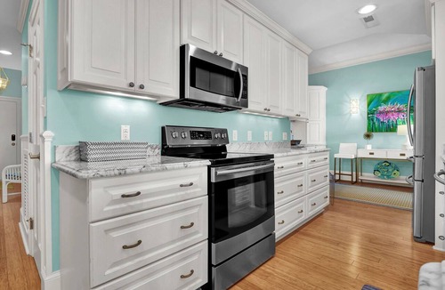 Shell Island Condo | 3BR/3BA Dune Ridge Condo with Elevator, Pool & Ocean Views