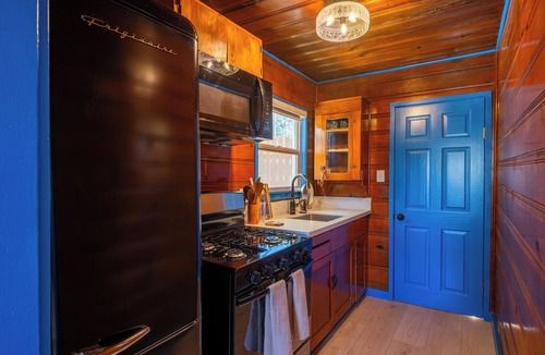 The Village Hotel | Arkouda Cabins: Lazuli Bunting