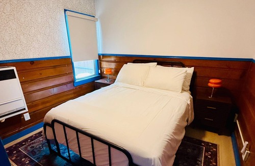 The Village Hotel | Arkouda Cabins: Lazuli Bunting