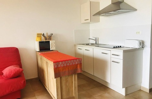 Marine de Saint Ambroggio Apartment | Beachfront Apartment with Terrace & Wi-Fi in Lumio, 4 Guests