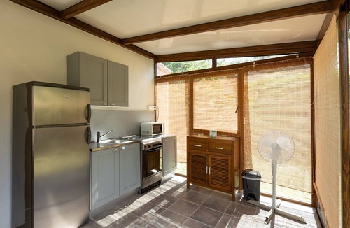Palasca House | Bungalow “Village Camping De L'ostriconi G2” with Sea View, Shared Pool & Wi-Fi