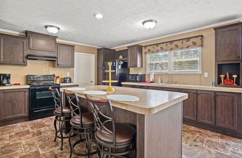 Chincoteague House | Charlie's Cove | Central Chincoteague Home w/Fenced Yard, Soaking Tub, Den & Pet Friendly Stay