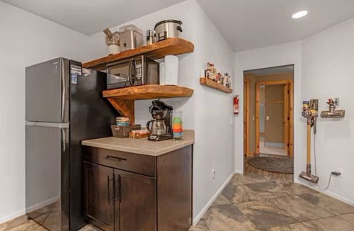 Bass Lake House | Charming Bass Lake cabin; roomy bedrooms; huge front deck; back patio w/fire-pit