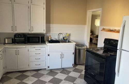 Laurel House | Charming convenient. 3-bedroom house in Laurel with AC,parking,storage,and more!