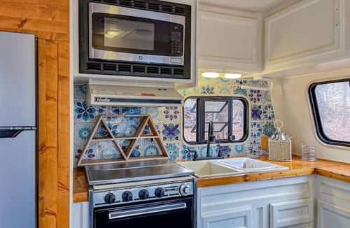Littleton House | Charming Lakefront Tiny Home with Fire Pit, Grill, and Bocce Ball Near Littleton, North Carolina
