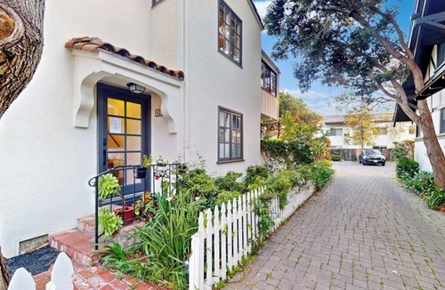 East Beach Apartment | Classic beach suite 1 block to ocean - fireplace, lovely patio, near downtown