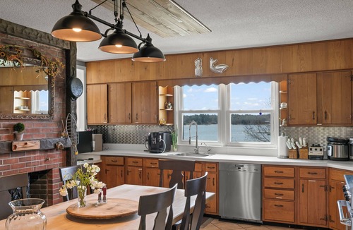 Pocasset House | Classic Cape Cod Home with a Heated Pool, Hot Tub and Spectacular Ocean Views.