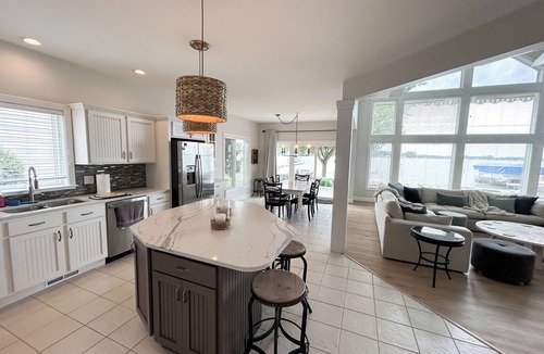 Coldwater House | Coldwater Lakefront Retreat with Gorgeous Water Views and Perfect Sandy Beach!