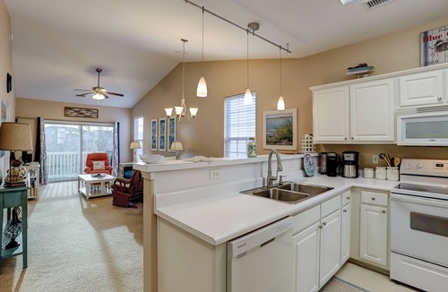 Sunset Beach Condo | Coral Hideaway: Balcony | Pool | Dog Friendly