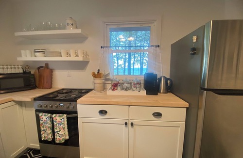 Fennville Cabin | Cozy 3-Bedroom Waterfront Cottage with Private Beach