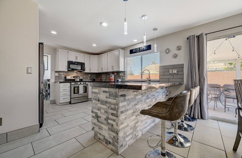 Silverado Ranch House | Cozy 5-Bedroom Oasis Near the Strip: Arcades, Pool, and BBQ Haven!