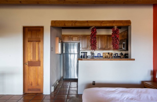 Arroyo Seco Apartment | Cozy adobe studio with private balcony, mountain views, and classic Southwest charm—just minutes from Taos, Arroyo Seco, and Taos Ski Valley. Perfect for a peaceful canyon escape with modern comforts.