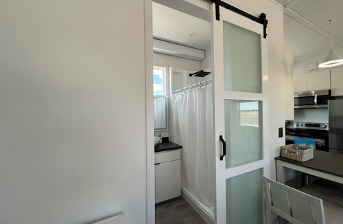 Beryl Junction House | Cozy Beach House tiny home in tranquil Beryl Utah with AC, WiFi, fitness room.