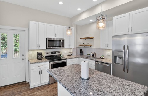 Michigan City House | Cozy Duplex Retreat | Hot Tub + Full Kitchen