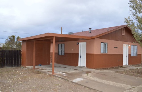 Gallup House | Cozy Single-Story Brown Bungalow