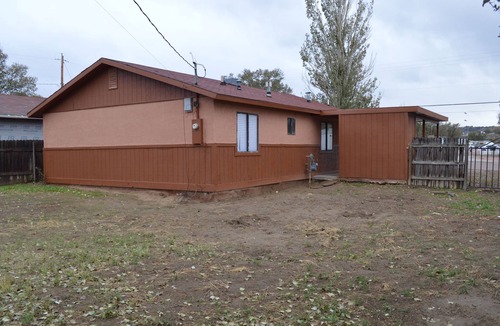 Gallup House | Cozy Single-Story Brown Bungalow