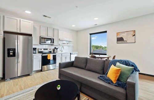 Lockerbie Square Apartment | CozySuites Mass with lounge and roof deck #7