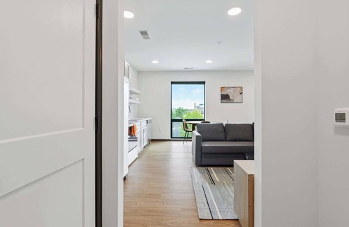 Lockerbie Square Apartment | CozySuites Mass with lounge and roof deck #7
