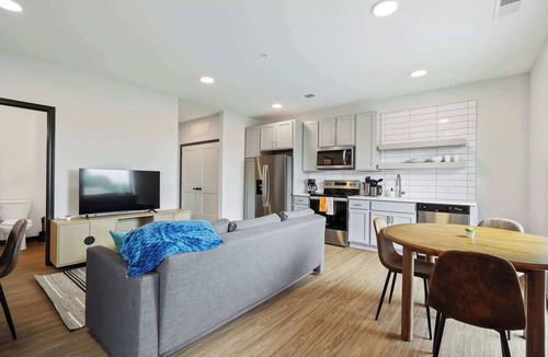 Lockerbie Square Apartment | CozySuites Mass with lounge and roof deck #7