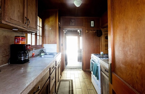 Idaho City Cabin | Creekside log cabin nestled between the pines of Idaho City