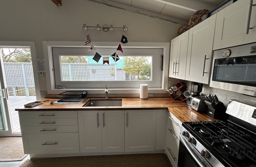 Bayberry Dunes House | Davis Park, Fire Island. Bay/sunset views. Updated 4 bed/2 bath house w A/C